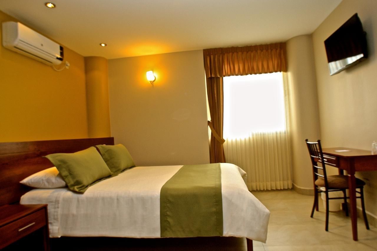 Hotel Puerto Banana El Guabo Ruang foto